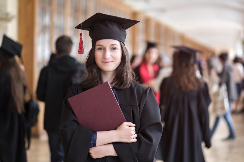 Woman holding degree